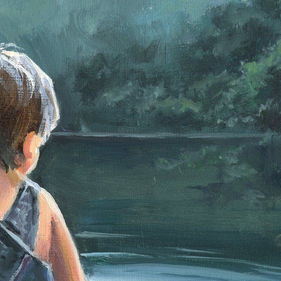 Child in twilight lake scene