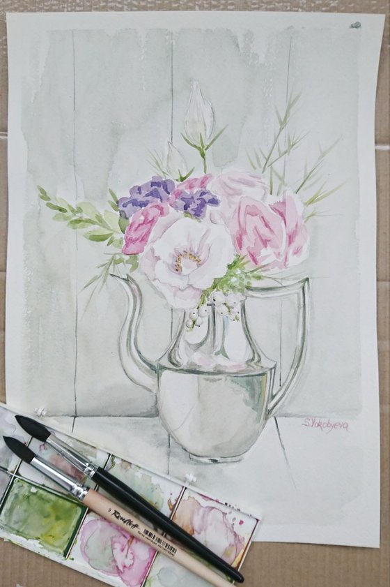 Flowers in a metallic jug