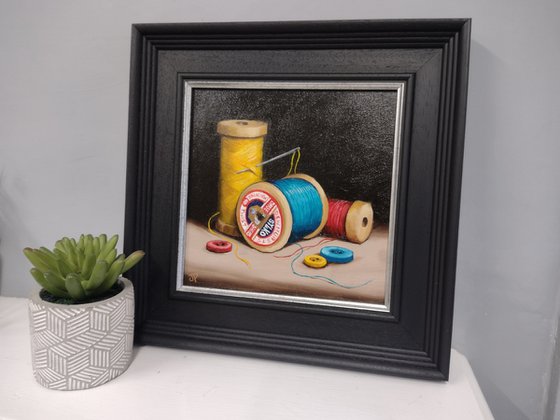 Vintage Cotton reels with buttons still life