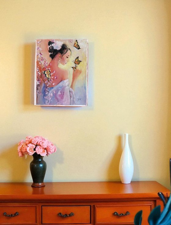 Portrait of a woman playing with Butterflies