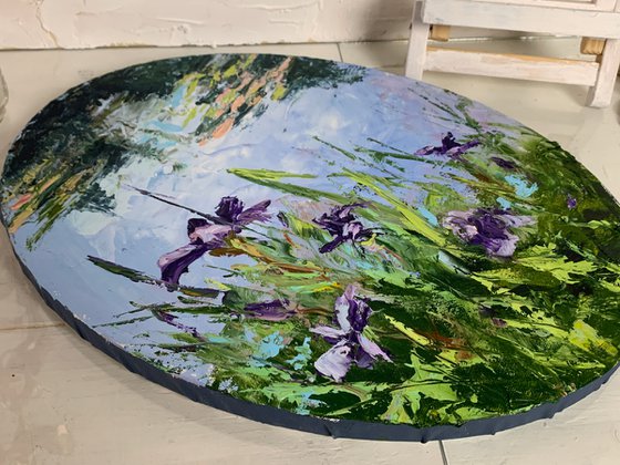 Water Lilly pond with violet flowers.