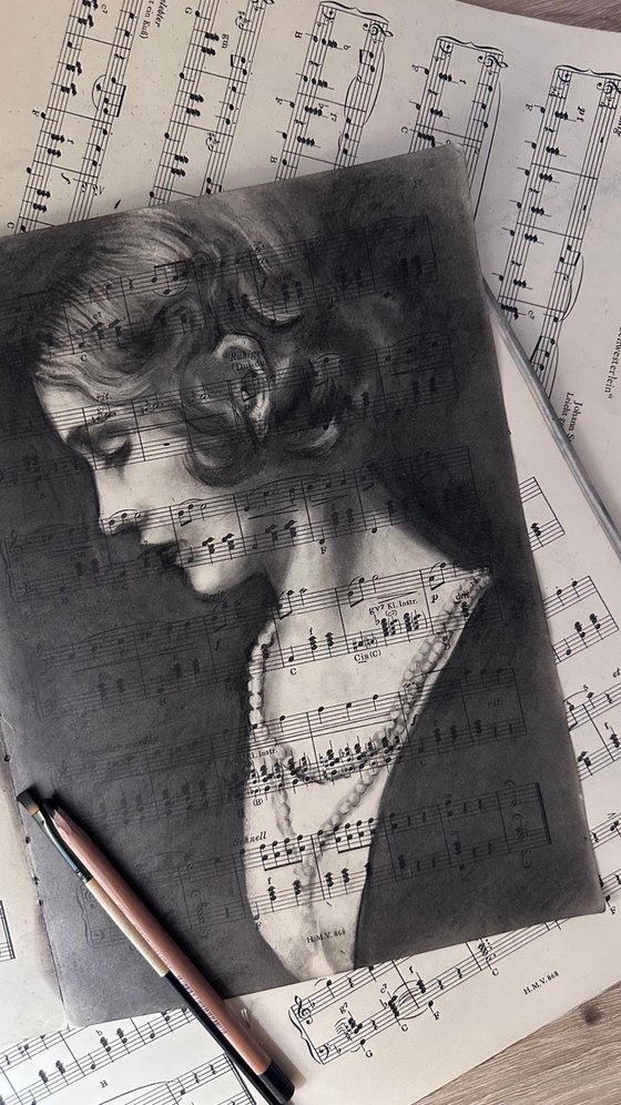 Woman's Portrait on Vintage Sheet Music