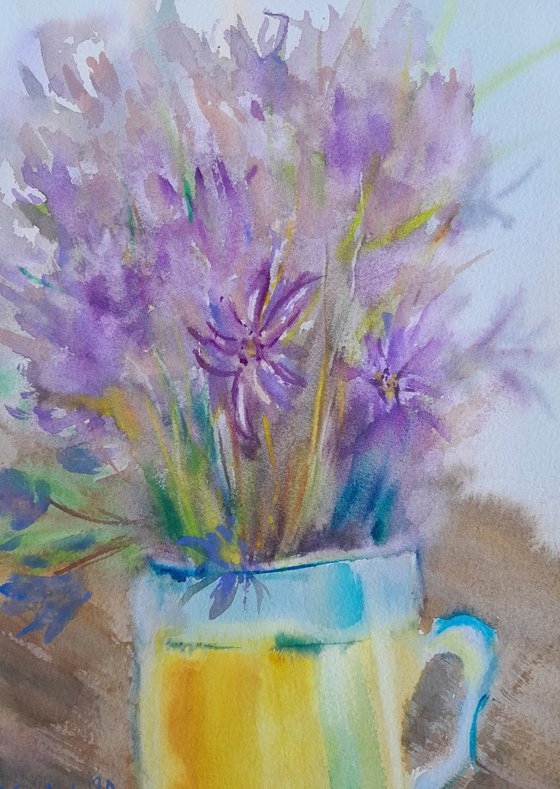 Wild flowers in a cup