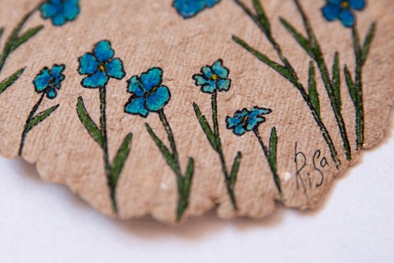 Blue flowers drawing on the author's craft paper