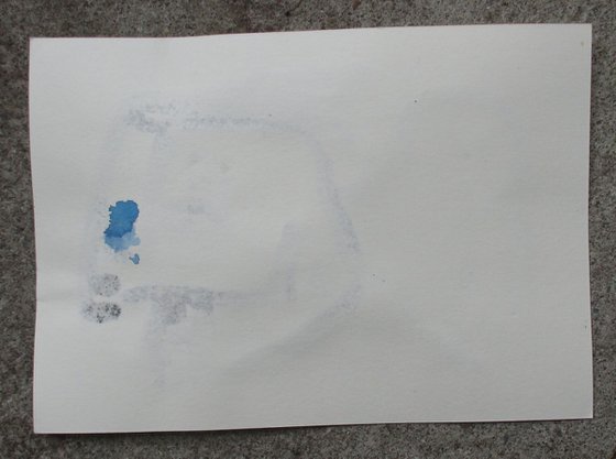 little blue lady drawing on paper
