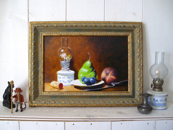 Oil lamp with fruits