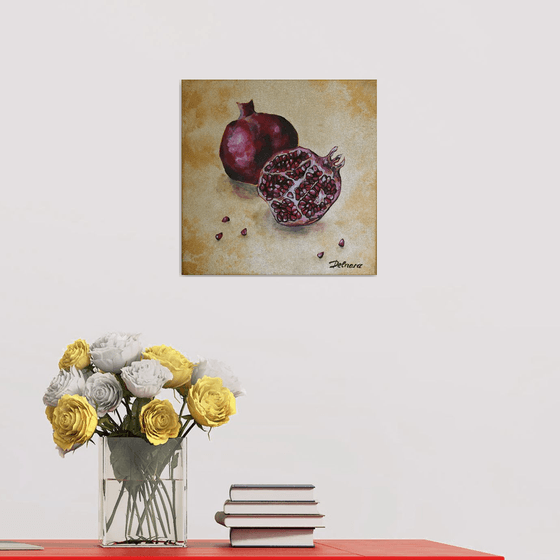 Pomegranates on a gold background