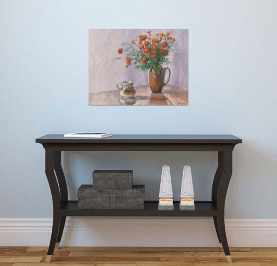 Marigolds in a clay pot