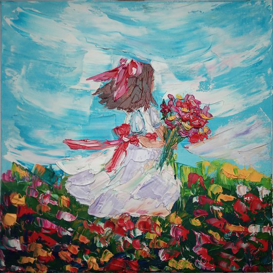 Girl in a flower meadow