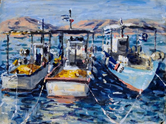 Three wooden boats