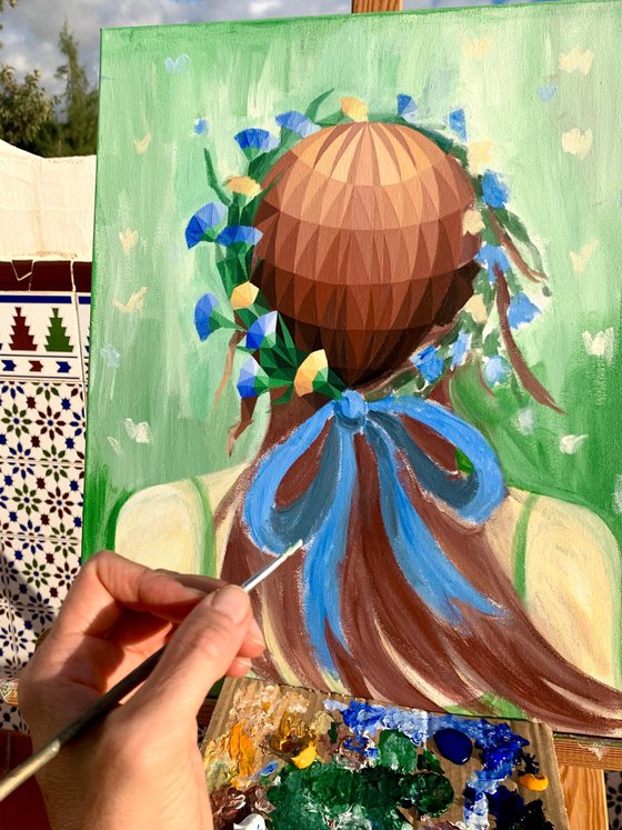 GIRL WITH FLORAL WREATH IN A FLOWER FIELD