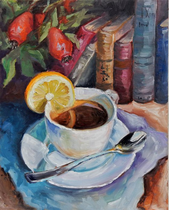 Teacup, books, flowers .Still life.