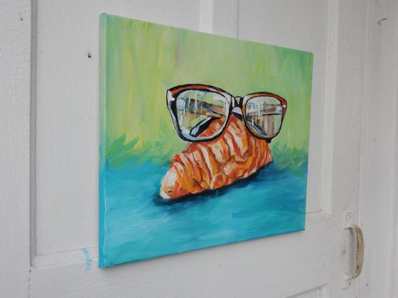 Croissant with glasses.