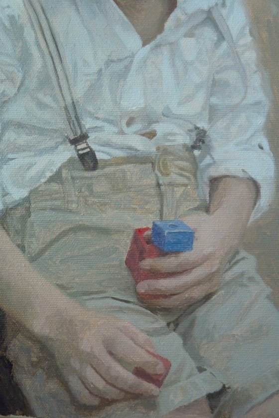 Boy with red and blue cubes