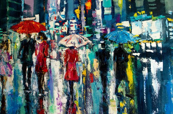 "Night city lights" ,  people with umbrellas