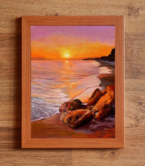 Sunset beach seascape with rocks