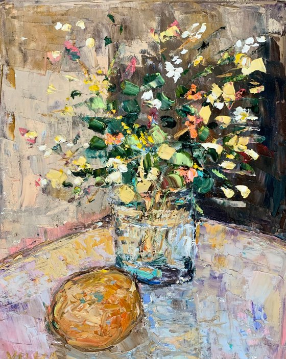 Still life with flowers and orange