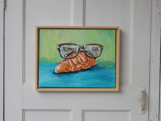 Croissant with glasses.