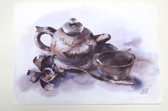 Brown teapot, cup and tree peony flower