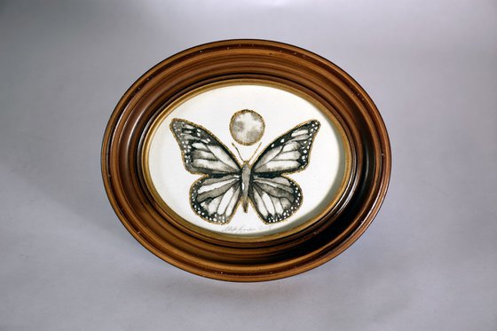 Oval Butterfly in an Antique Frame