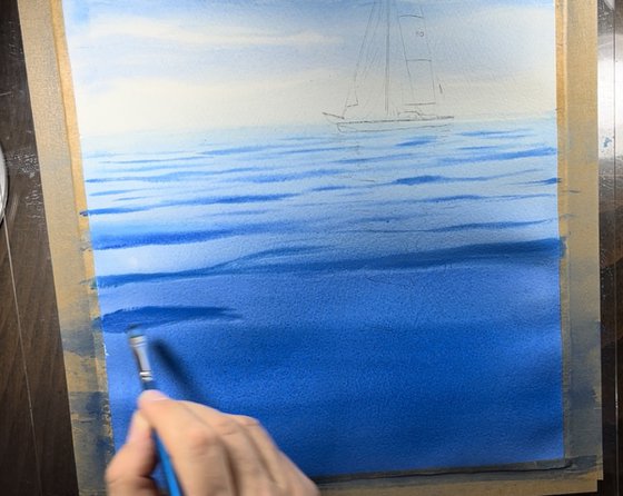 Tranquil Sea Sailboat Scene.