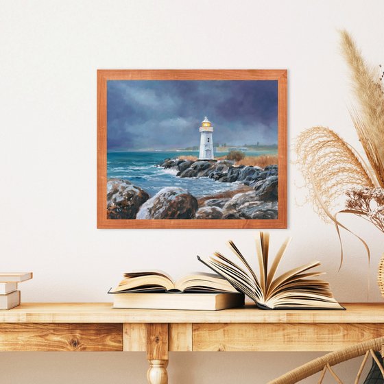 Lighthouse in blue-gray sky