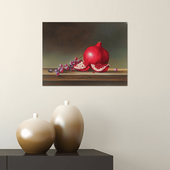 Still life with pomegranate and grape