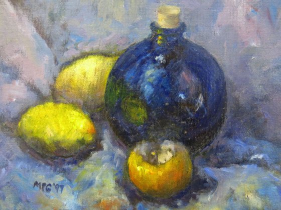 Blue bowl, pomegranite and lemons