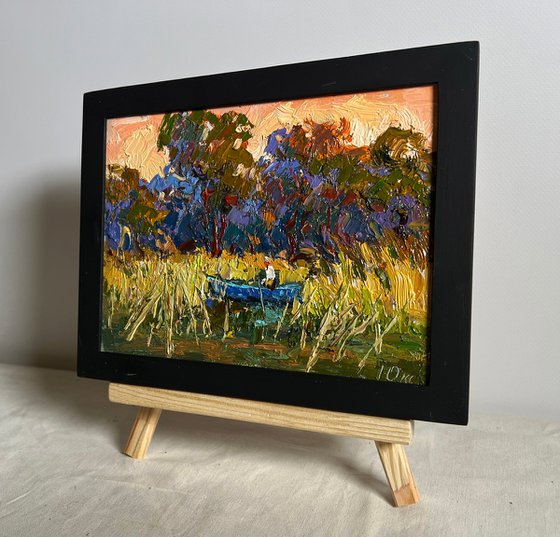 On a boat among the reeds