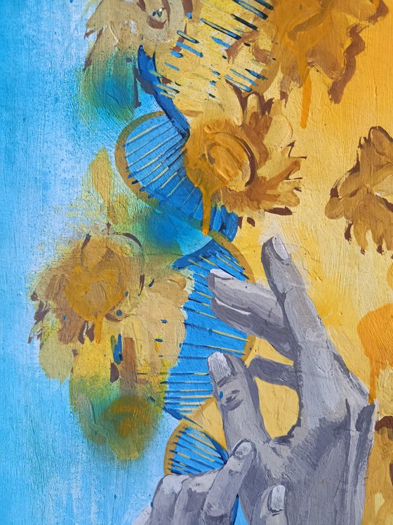 Hands in sunflowers