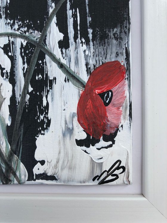 Red poppies in a frame