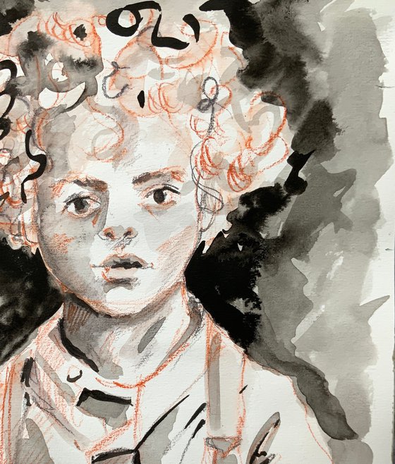 Portrait of a curly-haired boy