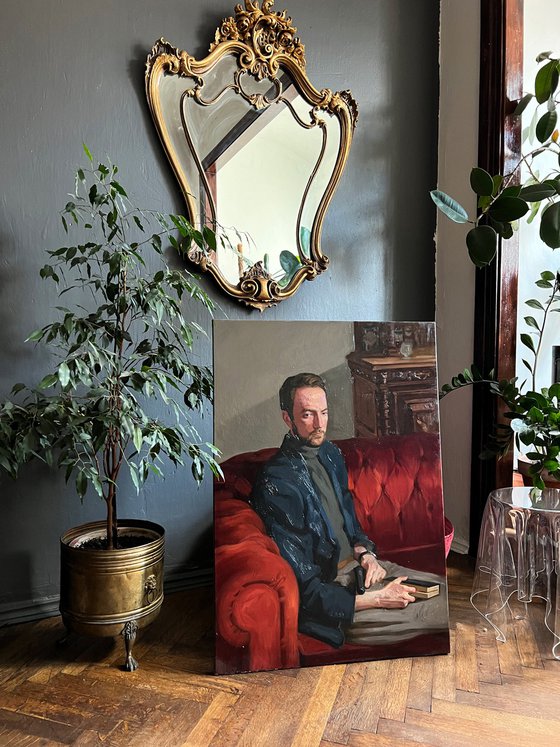 Portrait of a man with pistol and book