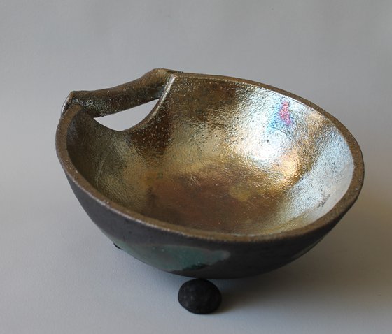 Raku Bowl with handle.