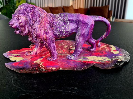 Lion walking through color