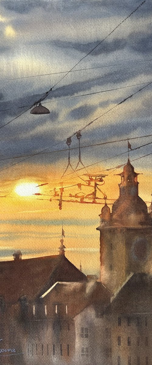 Sunset over roofs by Alina Karpova