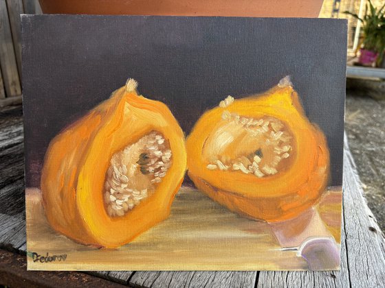 A small pumpkin cut in a half
