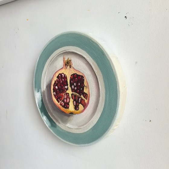 Pomegranate on plate