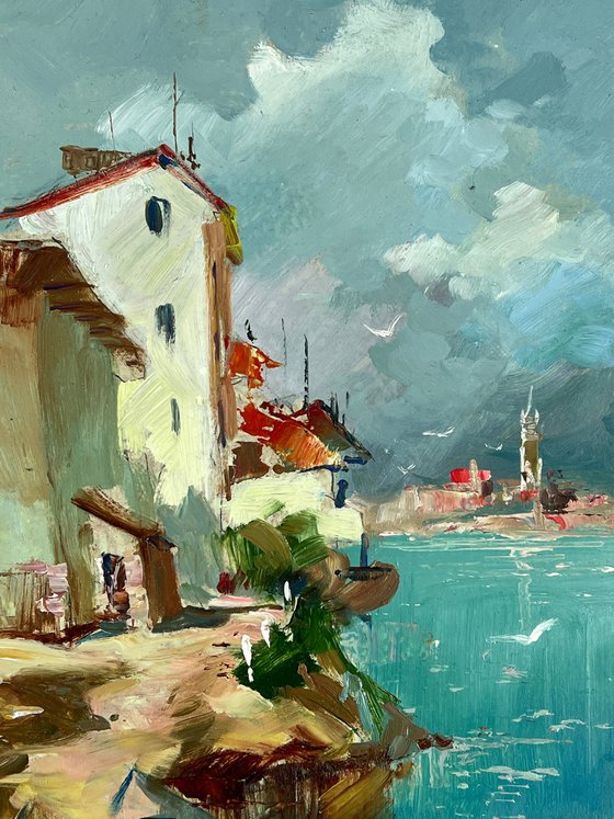 Two Boats at a Coastal House
