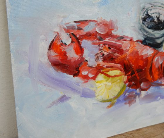 Something for your lunch. Still life with lobster and caviar.