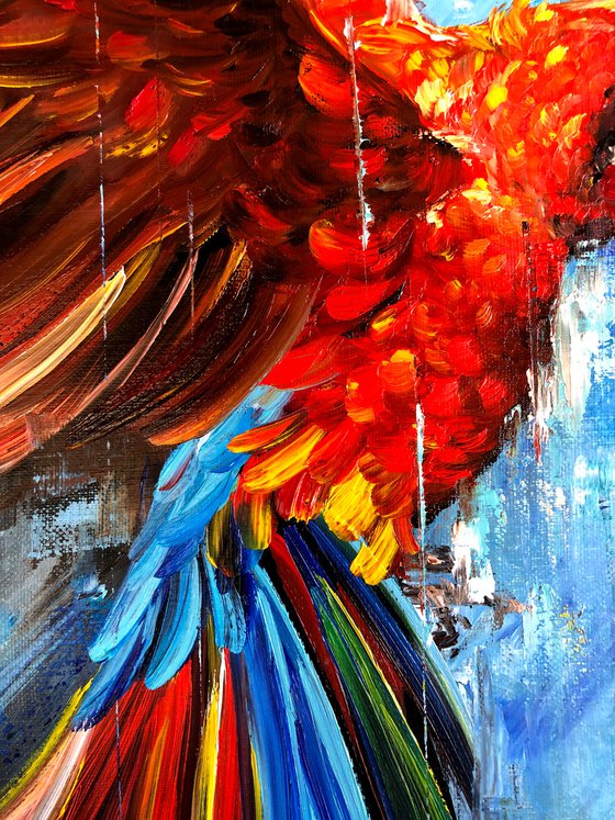 BRIGHTNESS OF FLIGHT - Red bird. Bright parrot. Ara parrot. A bird with large wings. Soaring parrot. Colorful feathers. Large beak. Lush tail. Blue background.