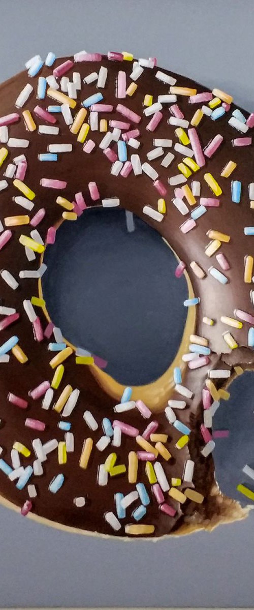 Chocolate donut with sprinkles by Peter Slade