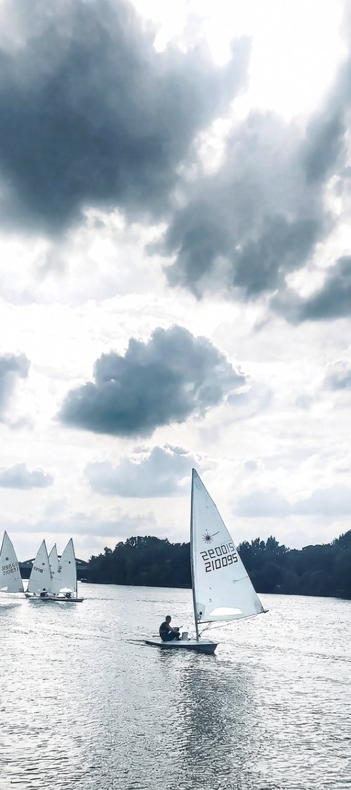 Sailing on the River Thames in cloudy London by Samira Malik