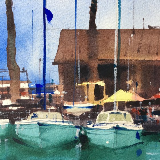 Yachts at the pier.  Lake Garda, Italy