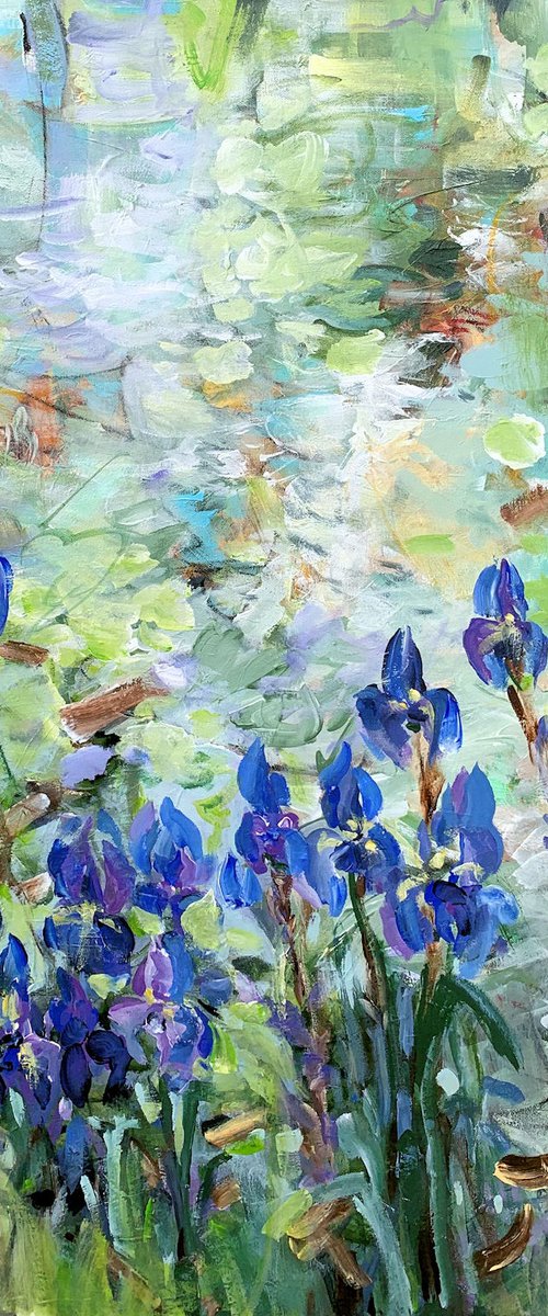 Blue irises at the pond by Irina Laube