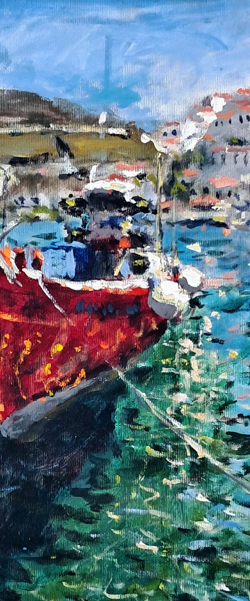 Red fishing boat by Dimitris Voyiazoglou