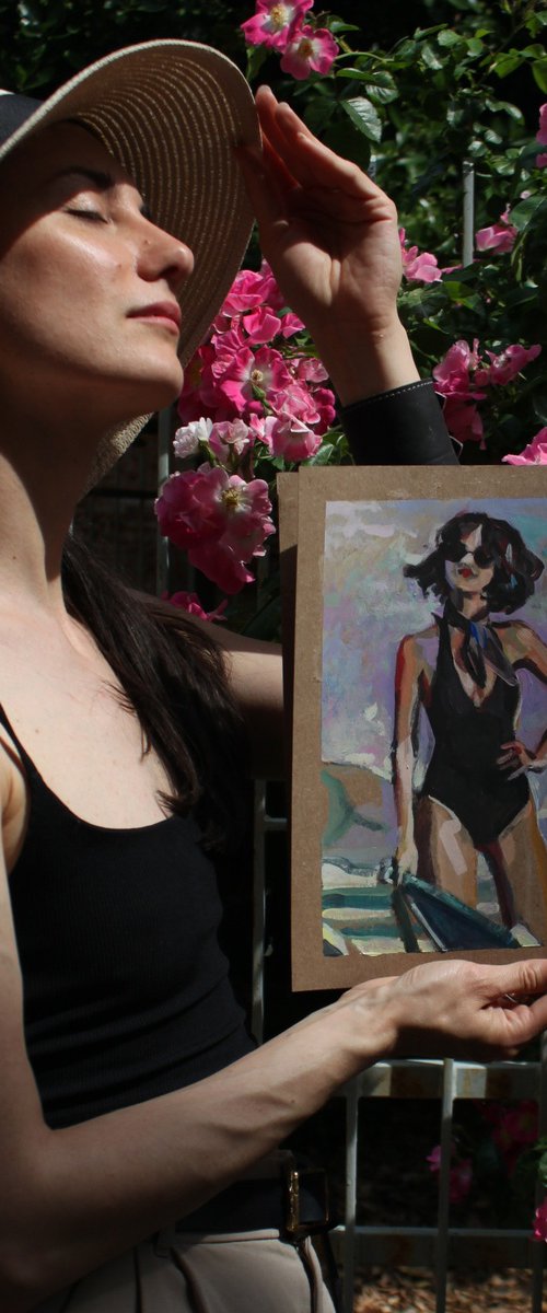 Girl in a black swimsuit On the beach by Iryna Tymkul