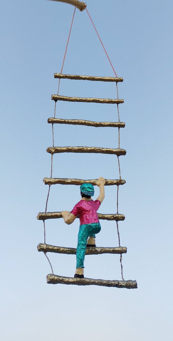Girl Climbing Ladder