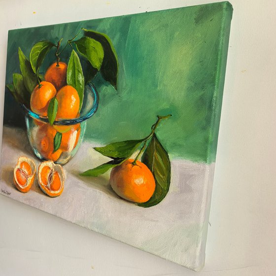 Tangerines in glass bowl