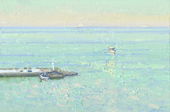 Sunset. The sea is calm. Bali. Crete. Greece